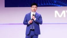 Arthur Wang delivering a keynote speech